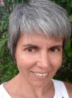 A person smiling for a picture
Description automatically generated