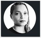 A person with braided hair
Description automatically generated